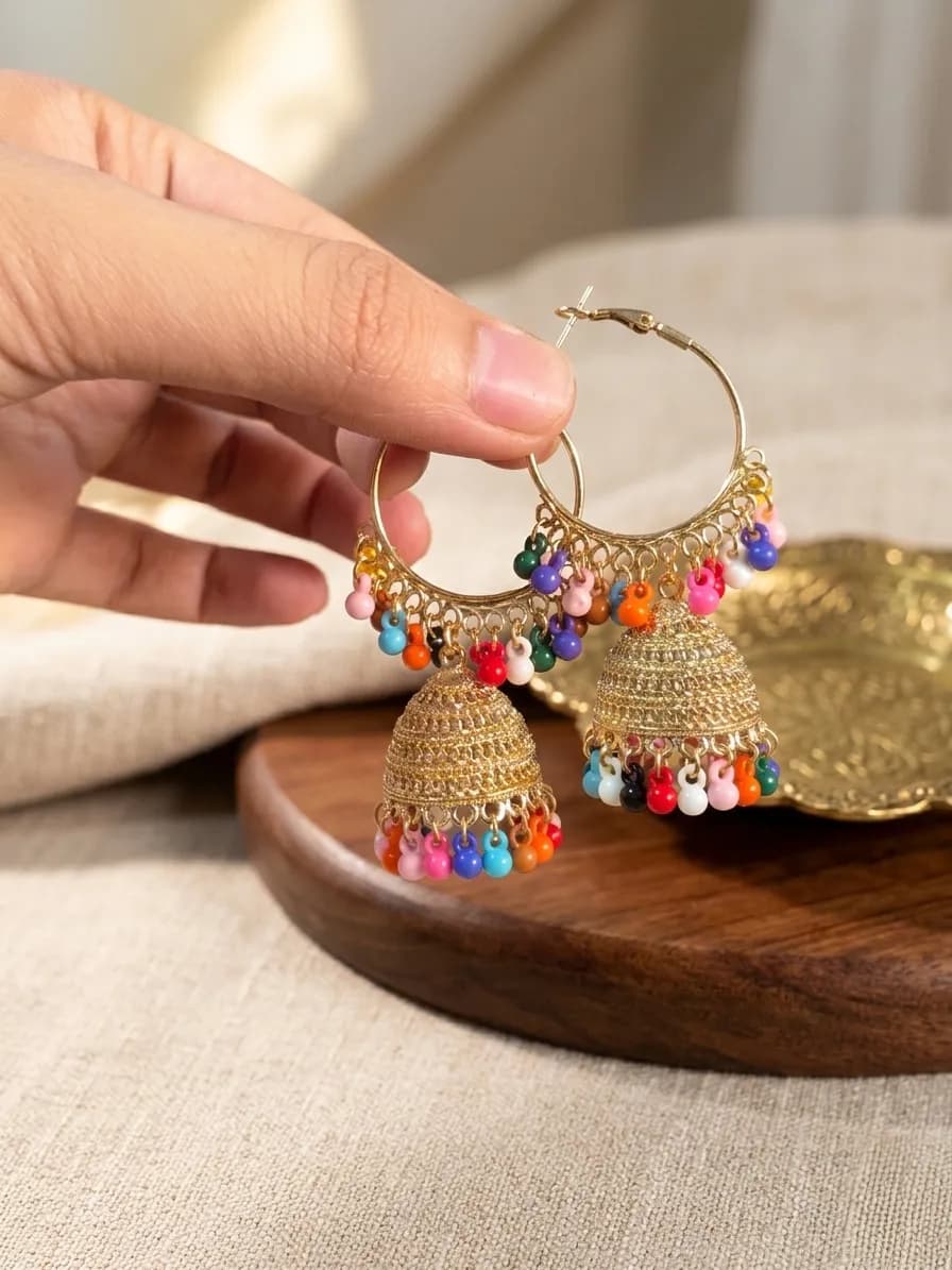 Golden Jhumka Earrings for Women with Crystal Tassels