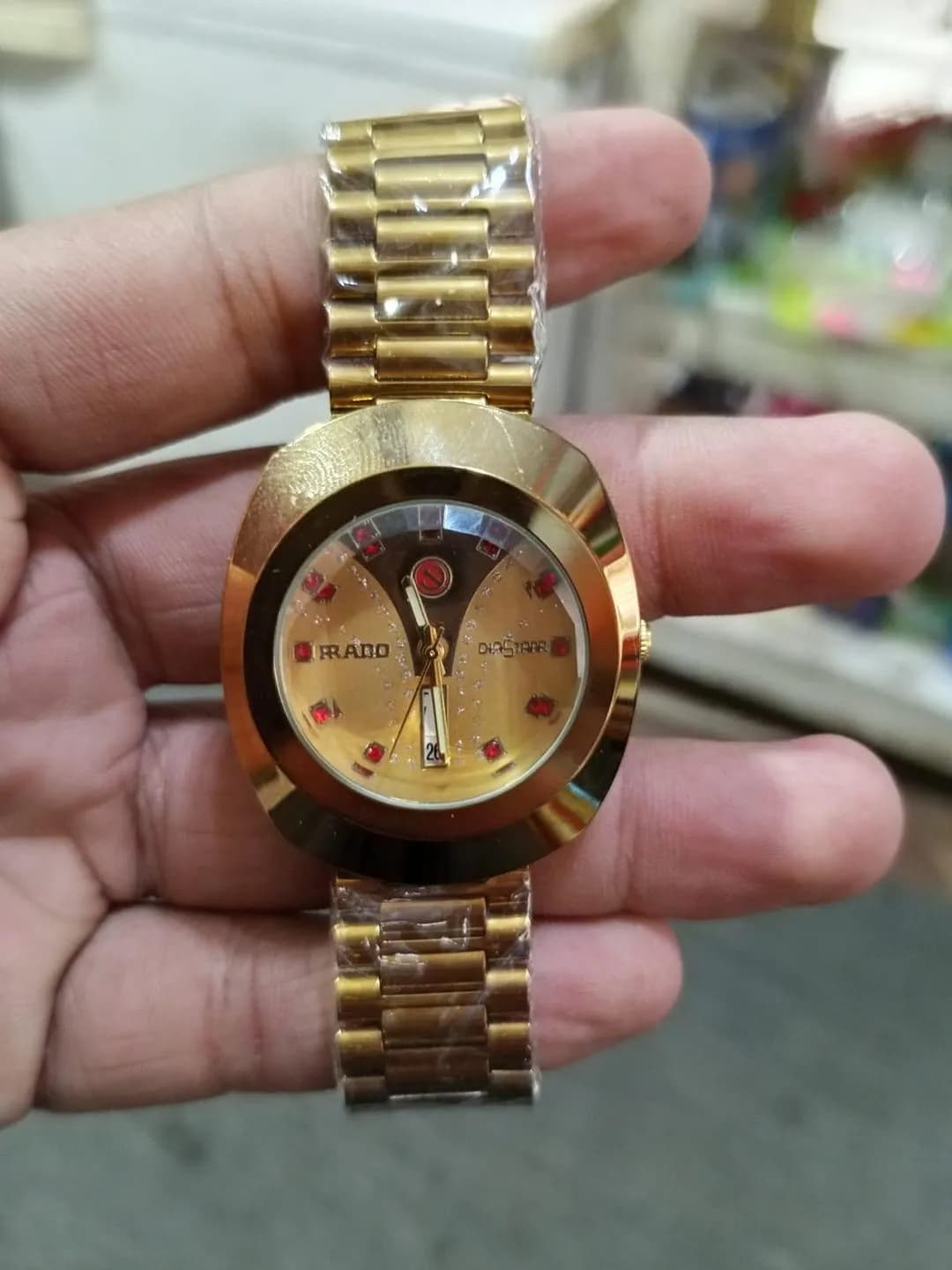 Rado DiaStar Original Gold Watch with Shield Design