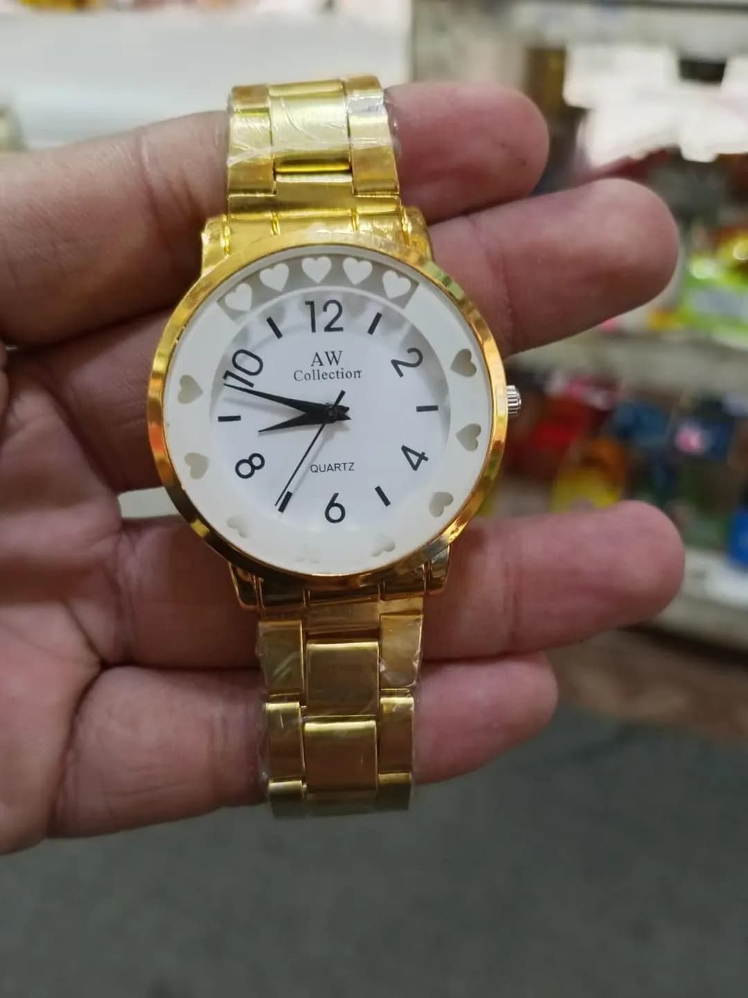 AW Gold Tone Quartz Watch with Heart Bezel