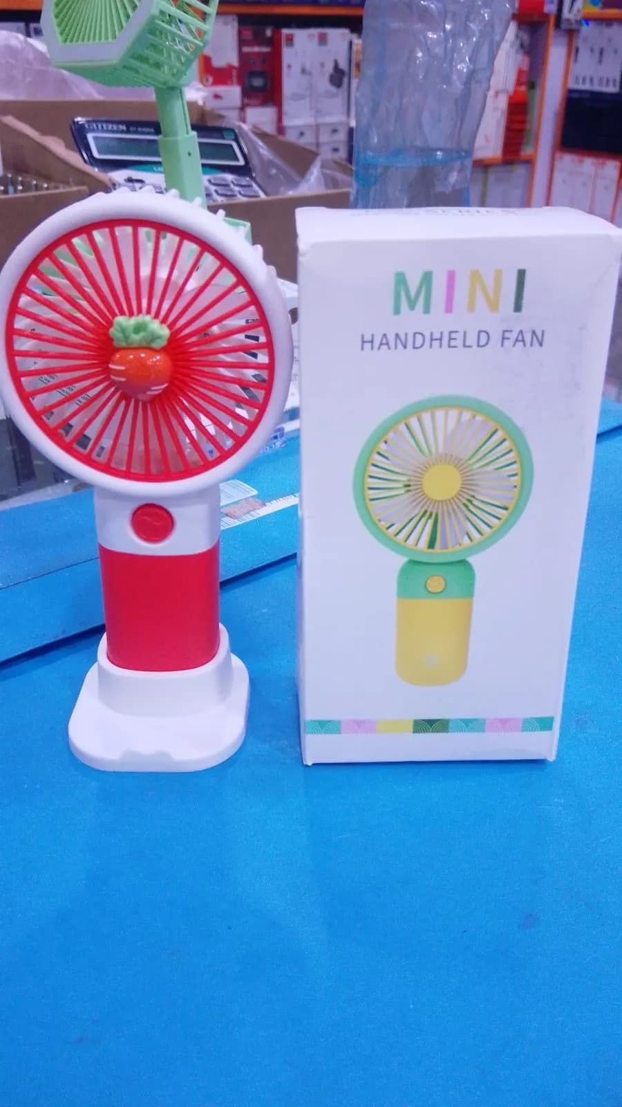 Mini Handheld Fan with Carrot Accent, Portable & Lightweight Cooling Device